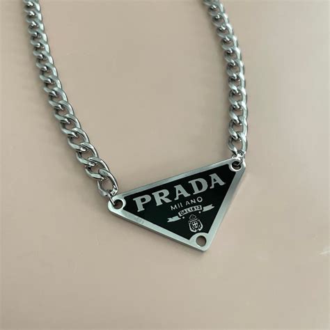 prada triangle charm|black prada necklace.